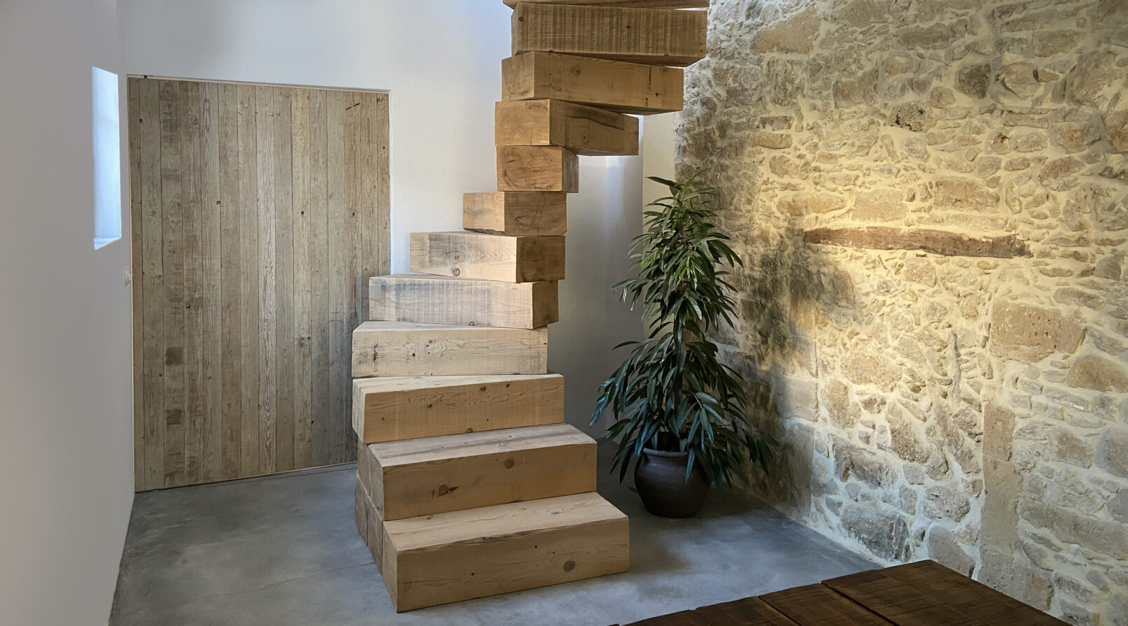 Wooden sculptural staircase stairs designed and constructed by Stone